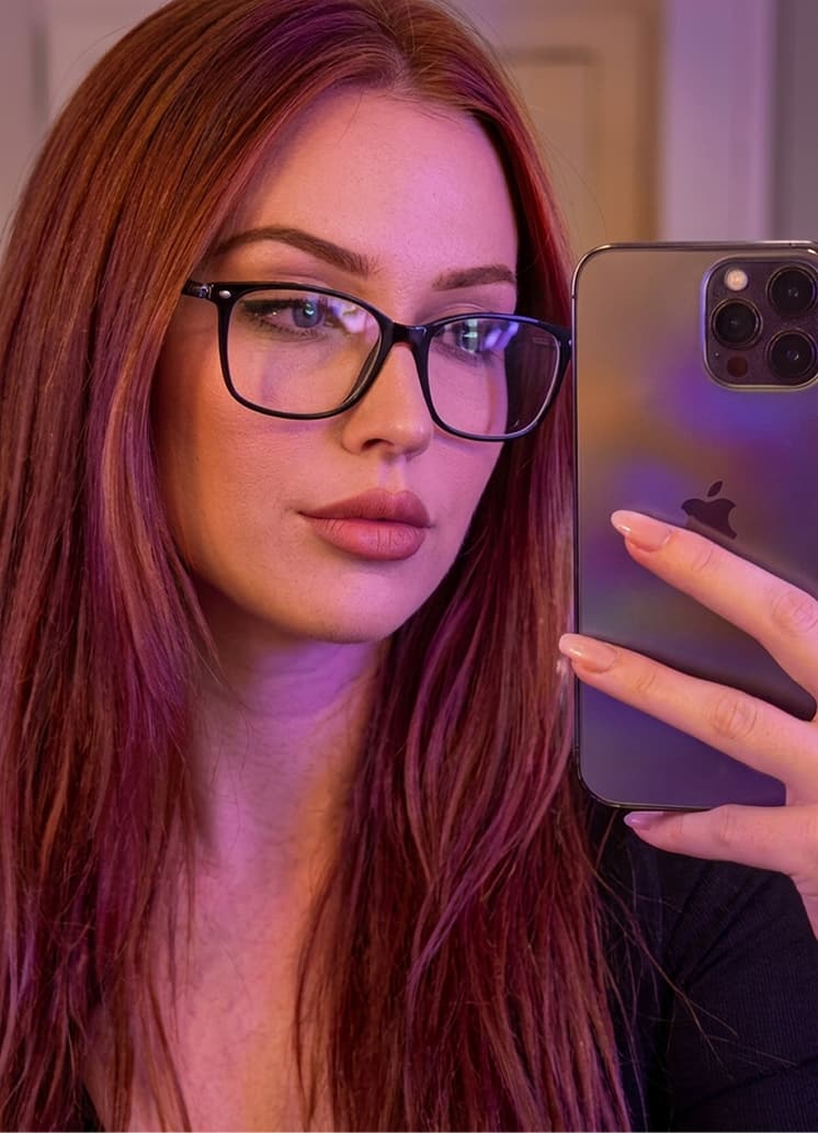 Creator in a pink top